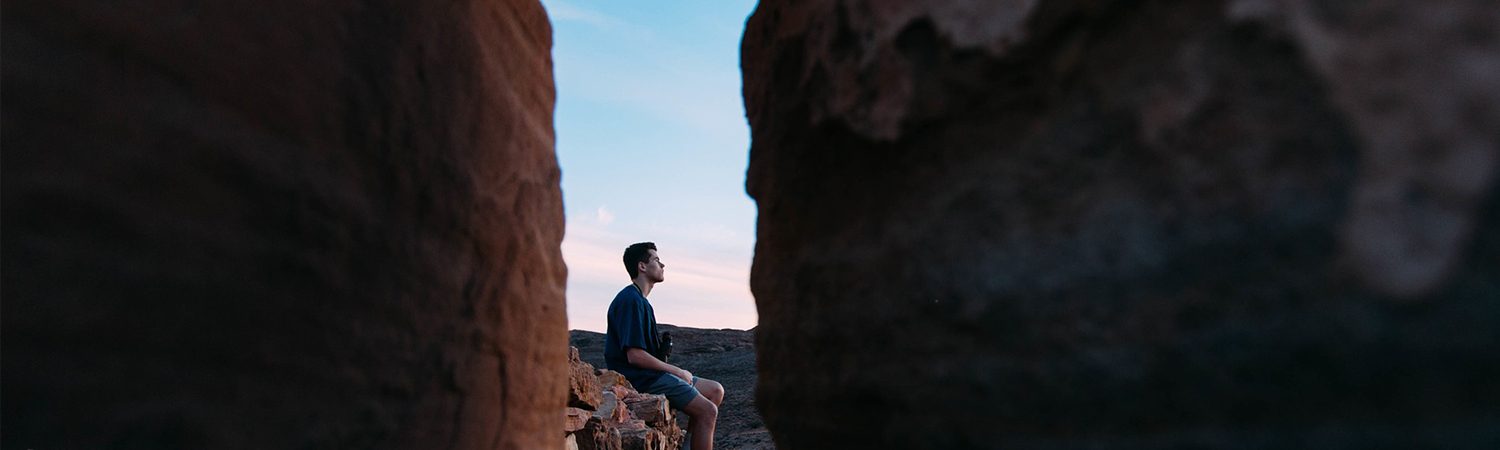 Man sitting on rocks